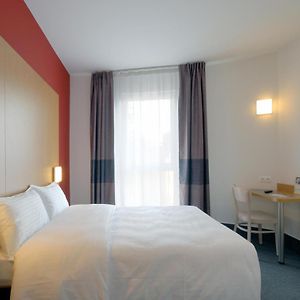 Kamer met een Queen Size Bed